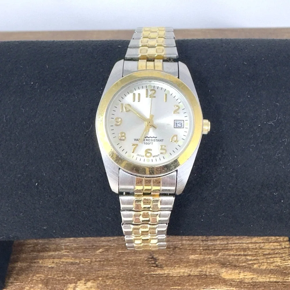 Geneva Womens Gold Tone Date Watch Water Resistant 100m Works Great